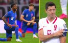 Robert-Lewandowski-and-the-Polish-players-point-to-the-RESPECT